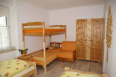 Ein Bett oder Betten in einem Zimmer der Unterkunft Ferienwohnung KerMärchen
