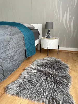 Ein Bett oder Betten in einem Zimmer der Unterkunft Apartments Badallee 4