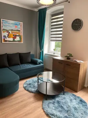 Ein Sitzbereich in der Unterkunft Apartments Badallee 4