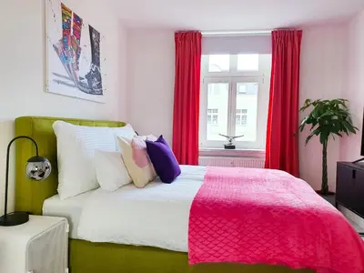 Ein Bett oder Betten in einem Zimmer der Unterkunft PB Ferienwohnungen - FeWo 6 - Stilvoll eingerichtetes Apartment im Herzen Senftenbergs