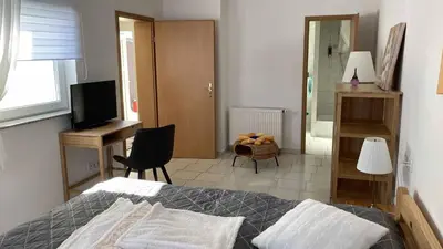 Ein Bett oder Betten in einem Zimmer der Unterkunft Pension zur 23