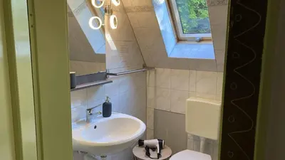 Ein Badezimmer in der Unterkunft Pension zur 23