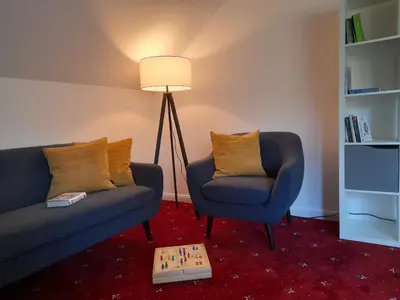 Ein Sitzbereich in der Unterkunft Gästehaus Weinberge
