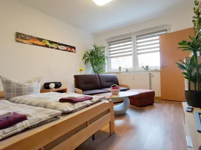 Ein Sitzbereich in der Unterkunft Ferienwohnung Kaltschmidt