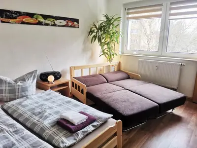 Ein Bett oder Betten in einem Zimmer der Unterkunft Ferienwohnung Kaltschmidt