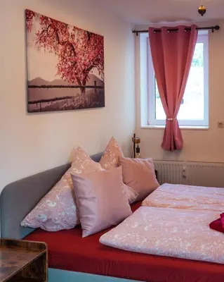 Ein Bett oder Betten in einem Zimmer der Unterkunft Appartementhaus- Bredner / Appartement II