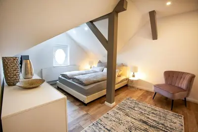Ein Bett oder Betten in einem Zimmer der Unterkunft Wohnperle Apartment Adele