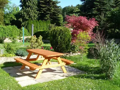 Ein Garten an der Unterkunft Ferienhaus Villa Maria - Ferienwohnung Chippendale