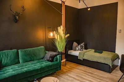 Ein Bett oder Betten in einem Zimmer der Unterkunft JETZT - modern & gemütlich - Waschmaschine - WIFI - 3 Personen