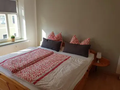 Ein Bett oder Betten in einem Zimmer der Unterkunft Ferienwohnung in Kamenz