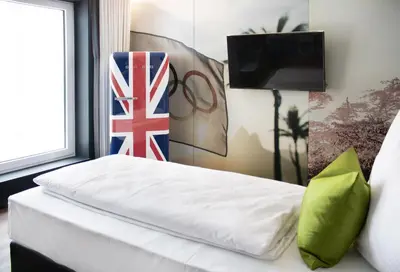 Ein Bett oder Betten in einem Zimmer der Unterkunft TO Hotel by WMM Hotels