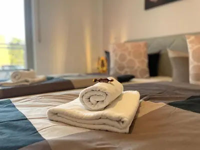 Ein Bett oder Betten in einem Zimmer der Unterkunft Dresden Rooftop Apartment mit 2 Balkone, Stellplatz, Top Anbindung