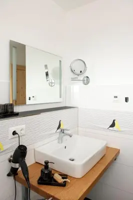Ein Badezimmer in der Unterkunft Pension Biohof Klügel