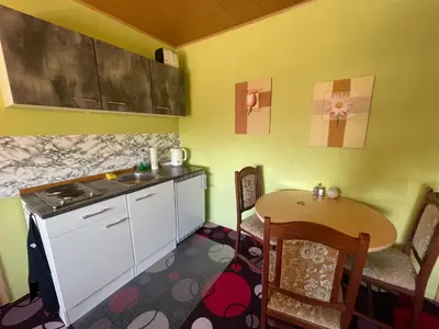 Küche/Küchenzeile in der Unterkunft Fremdenzimmer Nossen