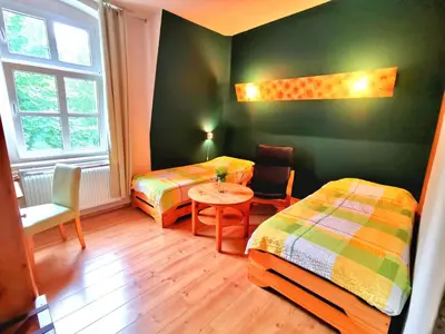 Ein Bett oder Betten in einem Zimmer der Unterkunft Riesige FeWo in Villa - 3 Schlafzimmer, 2 Bäder, Chemnitz