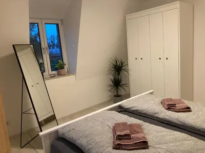 Ein Bett oder Betten in einem Zimmer der Unterkunft Ferienwohnung Sonnenblick