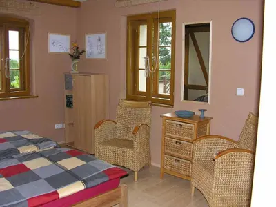 Ein Bett oder Betten in einem Zimmer der Unterkunft In der alten Weinstube
