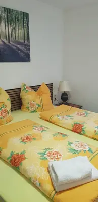 Ein Bett oder Betten in einem Zimmer der Unterkunft Pension Rudolph Riesa