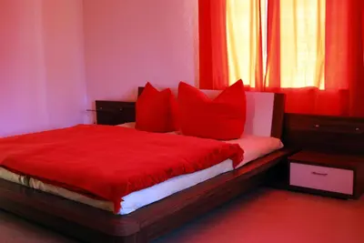 Ein Bett oder Betten in einem Zimmer der Unterkunft Villa De Baron