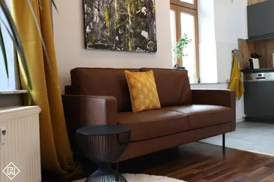 Ein Sitzbereich in der Unterkunft Design Studio - Netflix, Nespresso, Zentral