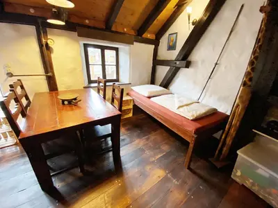 Ein Bett oder Betten in einem Zimmer der Unterkunft Ungewöhnliches Ferienhaus NAMIBIA-LODGE für 6 Pers - Rittergut Leppersdorf vor Radeberg bei Dresden