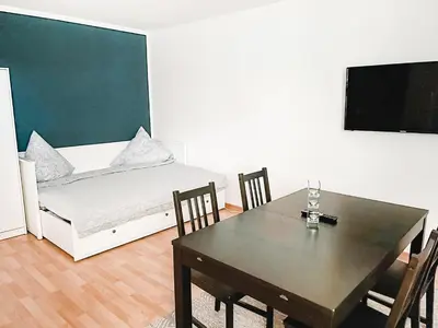 Ein Bett oder Betten in einem Zimmer der Unterkunft Schöne Wohnung, eigene Terrasse, privater Parkplatz, Wi-Fi, Waschmaschine, 3P
