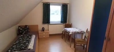 Ein Bett oder Betten in einem Zimmer der Unterkunft Ferienhaus Fabich Ganzes Haus