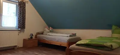 Ein Bett oder Betten in einem Zimmer der Unterkunft Ferienhaus Fabich Ganzes Haus