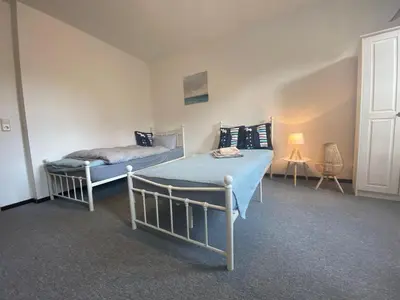 Ein Bett oder Betten in einem Zimmer der Unterkunft Sachsenhöhe