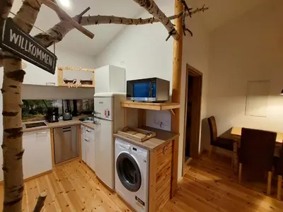 Küche/Küchenzeile in der Unterkunft elephants Ferienhaus Haus West