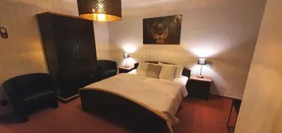 Ein Bett oder Betten in einem Zimmer der Unterkunft Stadthotel