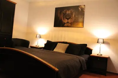 Ein Bett oder Betten in einem Zimmer der Unterkunft Stadthotel