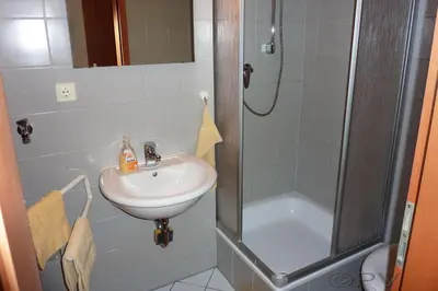 Ein Badezimmer in der Unterkunft Laurin Apartment L63