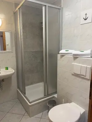 Ein Badezimmer in der Unterkunft Kapitänshaus