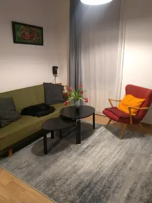 Ein Sitzbereich in der Unterkunft Ferienwohnungen in der Kunstgalerie