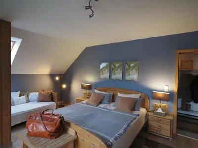 Ein Bett oder Betten in einem Zimmer der Unterkunft Villa Falkenstein