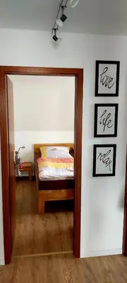 Ein Bett oder Betten in einem Zimmer der Unterkunft Ferienwohnung in Radeberg bei Dresden