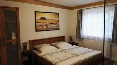 Ein Bett oder Betten in einem Zimmer der Unterkunft Fewo 4