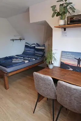 Ein Bett oder Betten in einem Zimmer der Unterkunft Kleines Studio am Uni-Campus - Perfekt für junge Unternehmungslustige