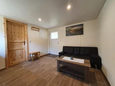 Ein Sitzbereich in der Unterkunft Ferienhaus Helmig