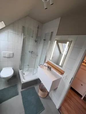 Ein Badezimmer in der Unterkunft FEWO 