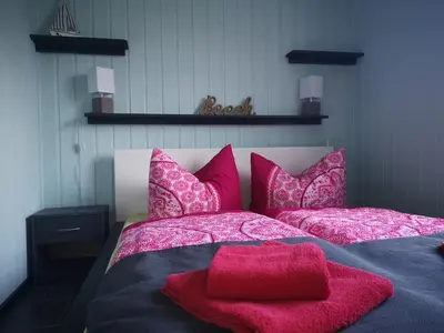 Ein Bett oder Betten in einem Zimmer der Unterkunft Bungalow Ulf
