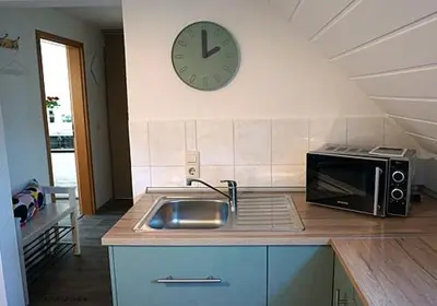 Küche/Küchenzeile in der Unterkunft Ferienwohnung Burgstädt
