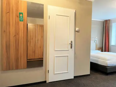 Ein Bett oder Betten in einem Zimmer der Unterkunft IBS Begegnungszentrum
