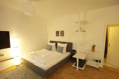 Ein Bett oder Betten in einem Zimmer der Unterkunft Nuvoom Workation, Highspeed Internet, zentral in der Dresdner Innenstadt