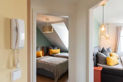 Ein Bett oder Betten in einem Zimmer der Unterkunft Bauhaus Apartment - Netflix, Nespresso, Zentral, Messe