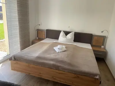 Ein Bett oder Betten in einem Zimmer der Unterkunft Die 1A Pension