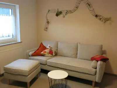 Ein Sitzbereich in der Unterkunft Ferienwohnung Schlesinger