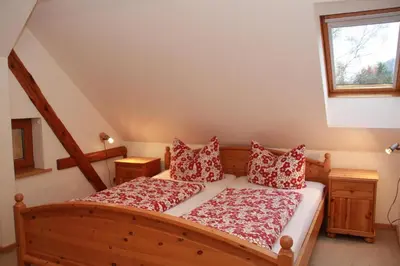 Ein Bett oder Betten in einem Zimmer der Unterkunft Ferienhof Schönfelder