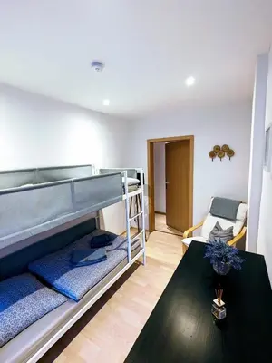 Ein Bett oder Betten in einem Zimmer der Unterkunft Ferienwohnung am Rabenauer Grund